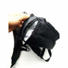 Hand revealing hidden zipper compartment in Smokeyz smell proof backpack