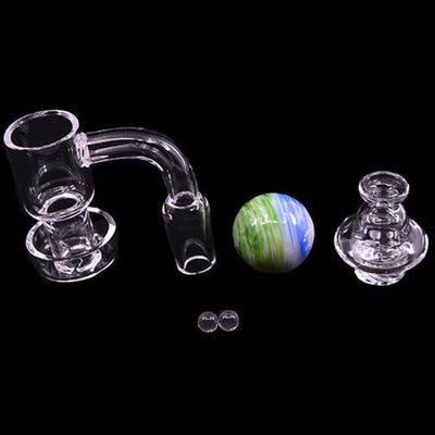 Terp Slurper Kit: Glass dab rig with a curved neck, colorful marble, and carb cap