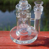 Glass water pipe with multiple chambers and 14mm male quartz banger