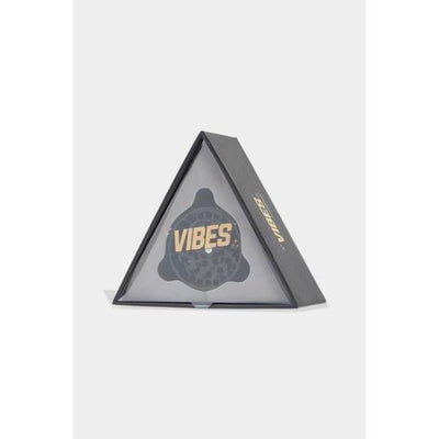 Triangular packaging of Vibes x Aerospaced 4-piece Grinder with anodized finish