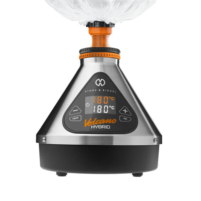 Digital desktop Volcano Hybrid Vaporizer with orange top and LED display for easy valve balloon
