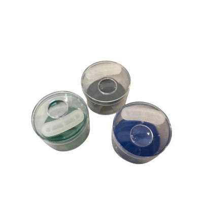 Three translucent 3.5-inch glass stash jars with colored gels for vaporizers and glass hand pipes