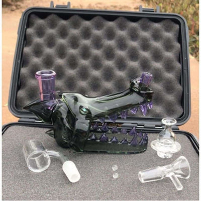 Wolf head water pipe with opal eyes and purple accents in a Pelican case